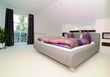 Modern, simply furnished bedroom